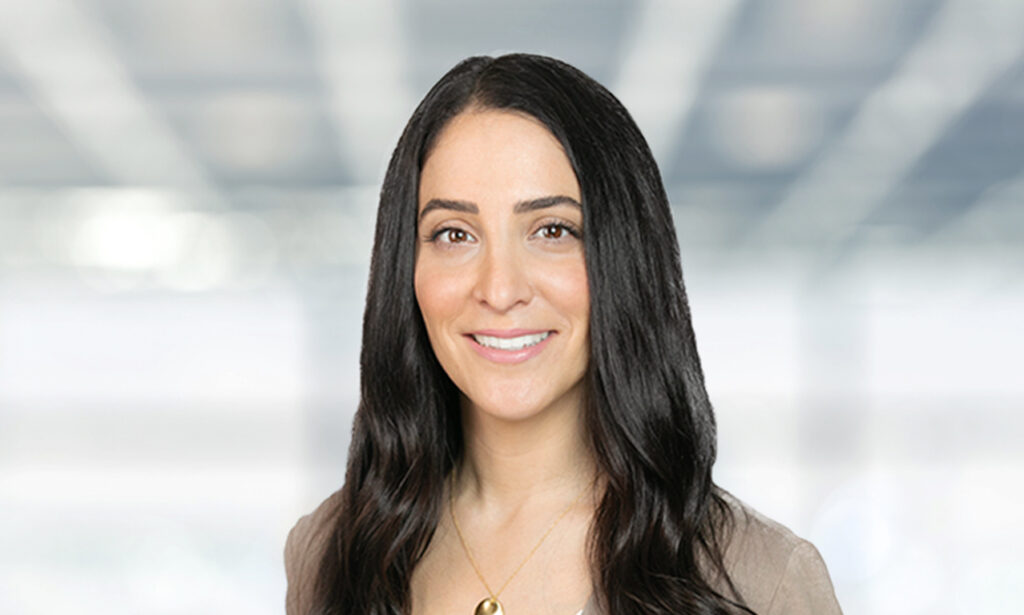 Gina is a young woman with long black hair